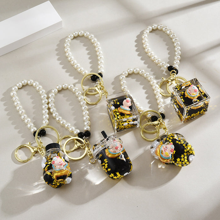 Wholesale Oil-Filled Black Gold Quicksand Piggy Liquid Keychain
