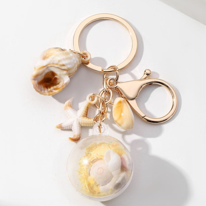 Wholesale Luminous Conch Sequin Small Ball Acrylic Keychain JDC-KC-RongRui055