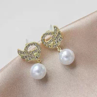 Wholesale Exquisite and elegant diamond studded pearl earrings, high-end and luxurious commuting versatile earrings, stylish and elegant style