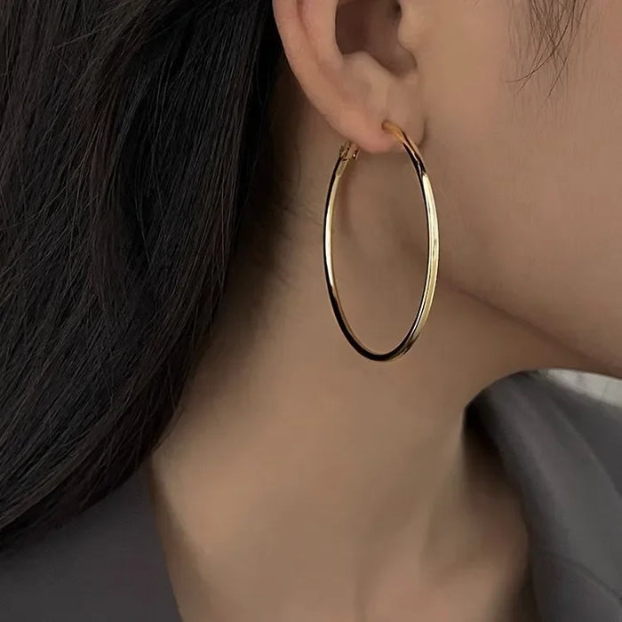 Wholesale Pure silver earrings with large circles, plain circles, and high-end feel. Round circle earrings