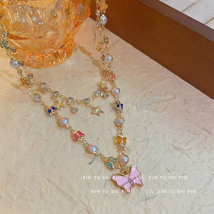 Wholesale Butterfly tassel necklace, double-layer layered versatile heart pendant, collarbone chain