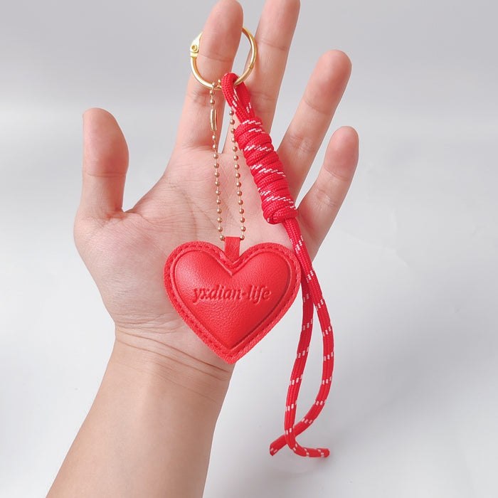 Wholesale Heart Shaped PU Leather Bag Charm Keychain Black Embossed With Braided Rope Car Hanging Ornament Boutique Resale Gift