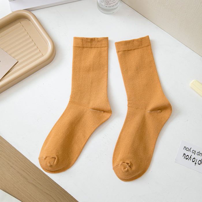 Wholesale White mid length socks made of pure cotton, high cut, and elastic, long socks that absorb sweat and pile up socks