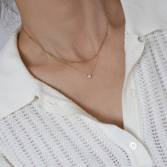 Wholesale Exquisite single diamond small double-layer necklace, gold bead collarbone chain, titanium steel electroplating
