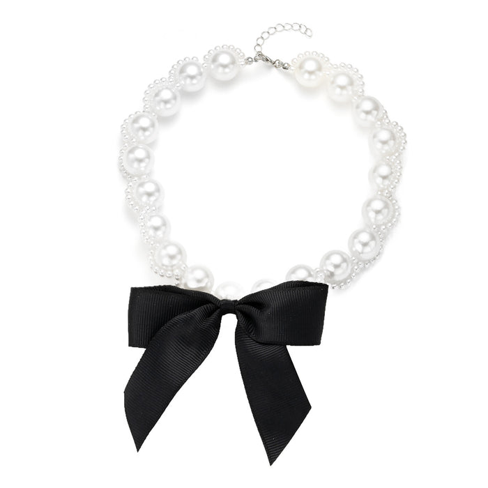 Wholesale Retro exaggerated ribbon bow necklace with light luxury and high-end feel, imitation pearl collarbone chain necklace