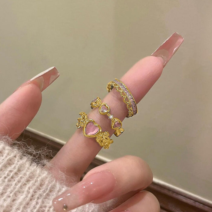 Wholesale Set of open-faced diamond-encrusted heart-shaped rings.