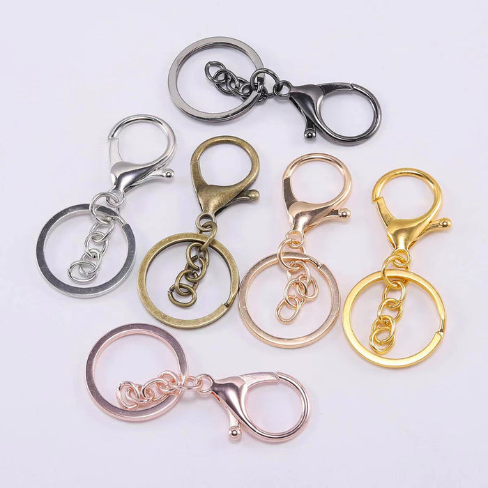 Wholesale  alloy keychain lobster buckle  gold bag doll pendant keychain accessories