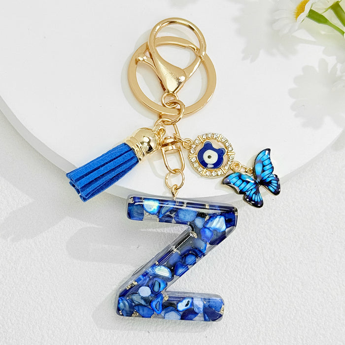 Wholesale Royal Blue 26 Letter Keychain with Evil Eye Butterfly Tassel Pendant