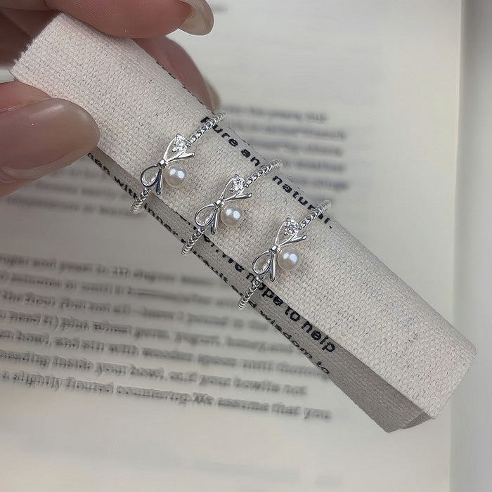 Wholesale Pure silver bow pearl ring, luxurious and exquisite sparkling diamond ring