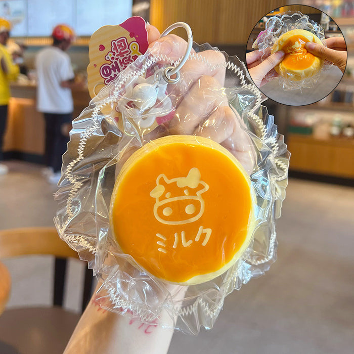 Wholesale Milk Pudding Squeeze Toy Keychain Food Grade Silicone Stress Relief Bag Charm Boutique Resale Gift