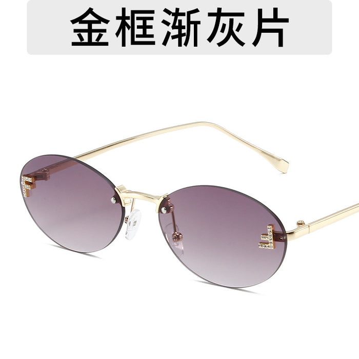 Wholesale Elliptical frame small frame sunglasses, new frameless cut edge personalized glasses, dot diamond sunglasses