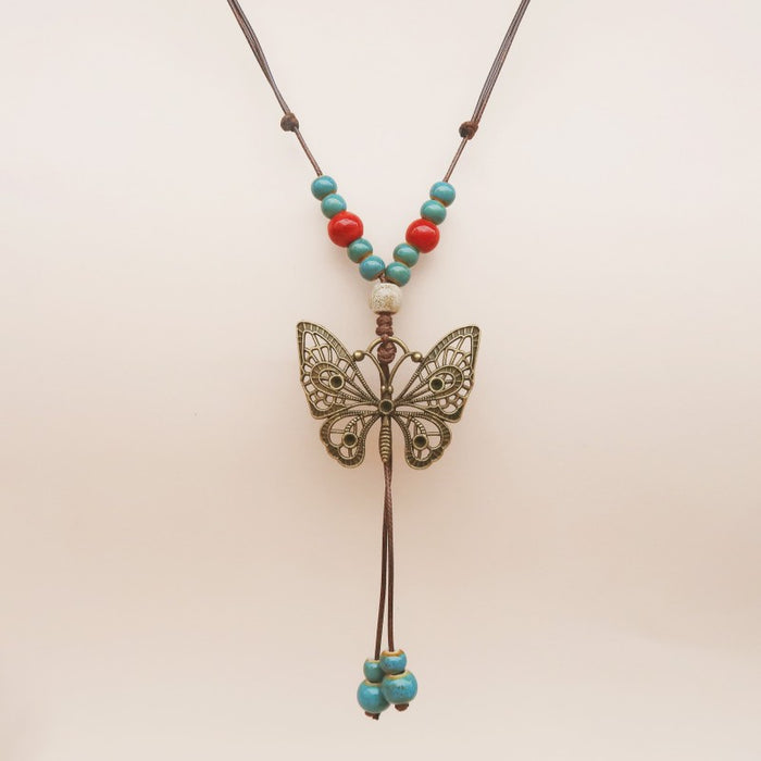 Wholesale Long sweater chain women's pendant retro butterfly necklace