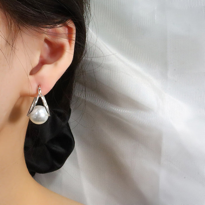 Wholesale Double layer pearl earrings with retro and simple commuting design, double circle pearl earrings