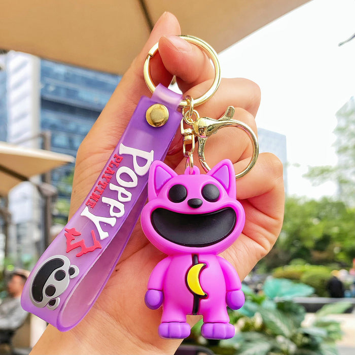 Wholesale Cute silicone smiling animal keychain