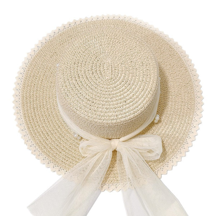 Wholesale Seaside big edge sun hat, beach grass hat, wavy edge pearl bow sun hat