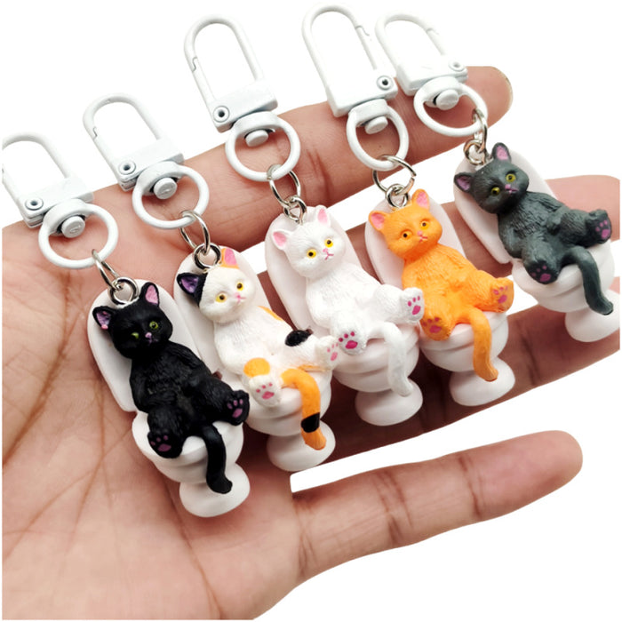 Wholesale Cartoon Sitting Toilet Kitten PVC Keychain JDC-KC-TYS019