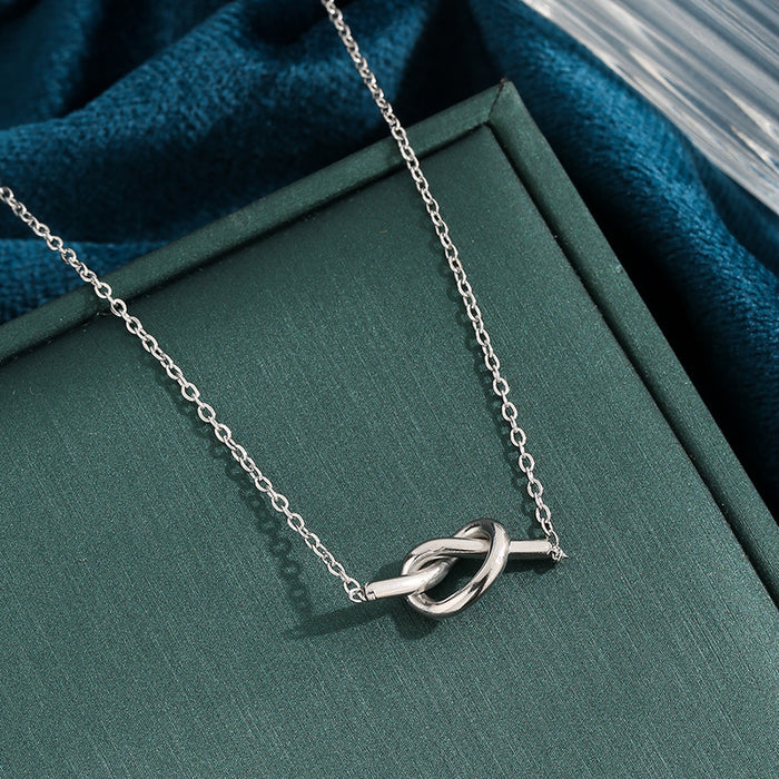 Wholesale Cross border new niche knot double heart winding pendant titanium steel O-shaped necklace simple and fashionable temperament exquisite