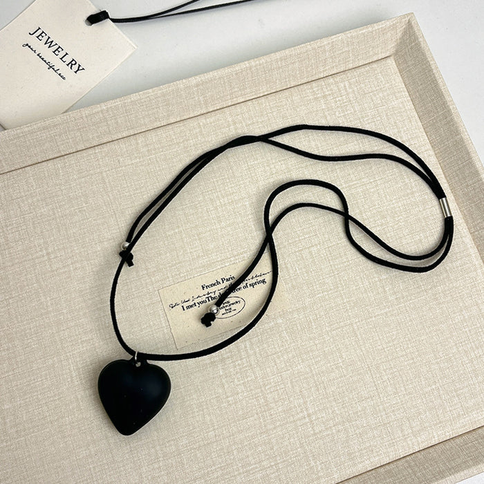 Wholesale Love pendant necklace, long leather rope adjustable sweater chain, high-end sweatshirt accessory