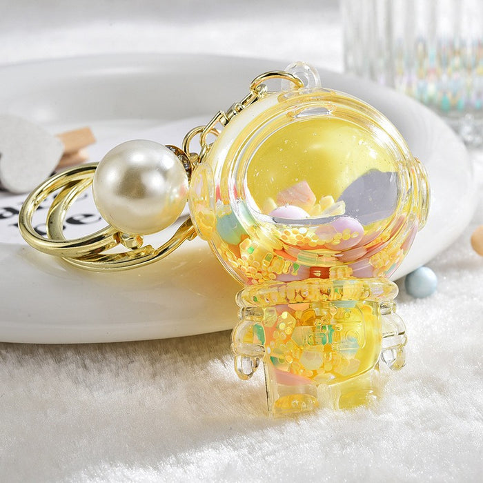 Wholesale Acrylic oil bottle candy Bean astronaut keychain