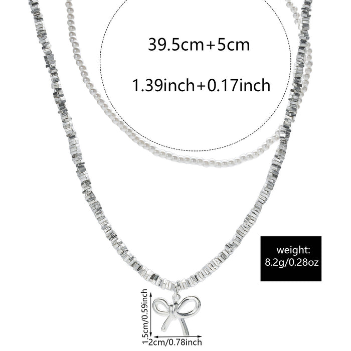 Wholesale Cross border new bow necklace with simple and high-end feel, retro double-layer layered design, imitation pearl collarbone chain