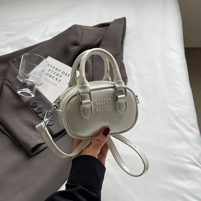 Wholesale Retro mini handbag, girl's parent-child super small pillow bag, crossbody bag