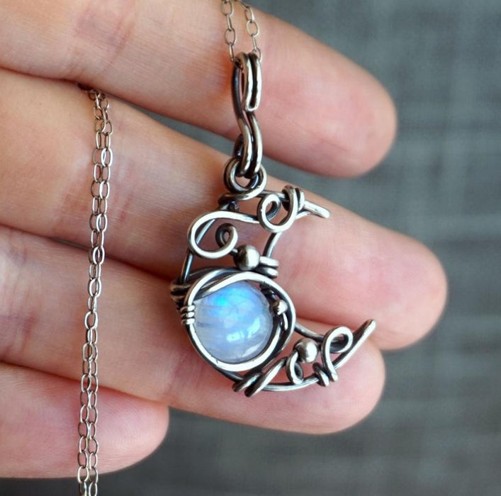 Wholesale New retro moonstone necklace with threaded hollow moon pendant