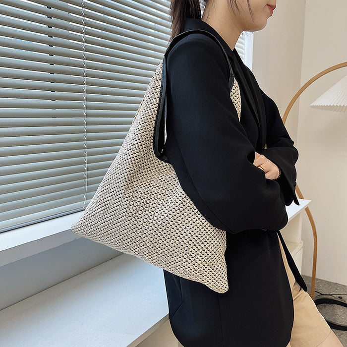 Wholesale New straw woven bag, fashionable and simple hollow shoulder bag, vacation and western-style beach bag, grass woven