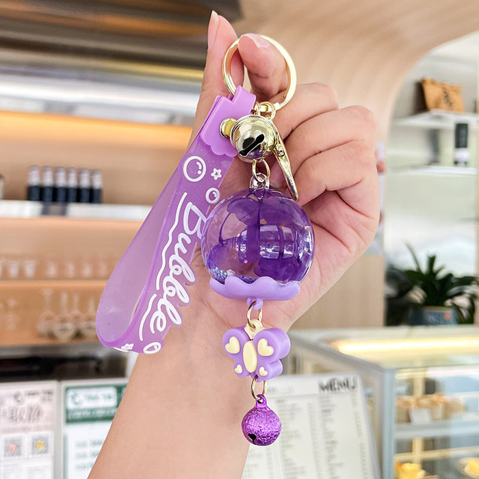 Wholesale Acrylic Oil-filled Wind Chime Quicksand Floating Doll Keychain JDC-KC-Benxin024