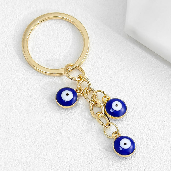 Wholesale Heart-Shaped Palm Water Drop Devil's Eye Pendant Keychain