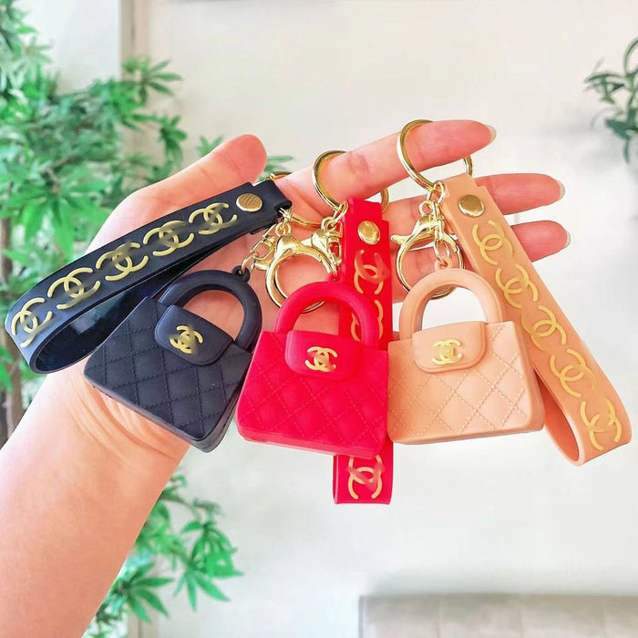 Wholesale Cartoon keychain silicone mini bag pendant car keychain fashion gift