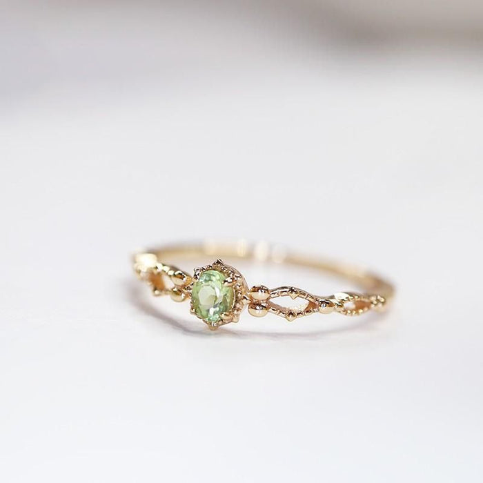 Wholesale Olivine ring hollowed out zircon adjustable ring gold plating niche design