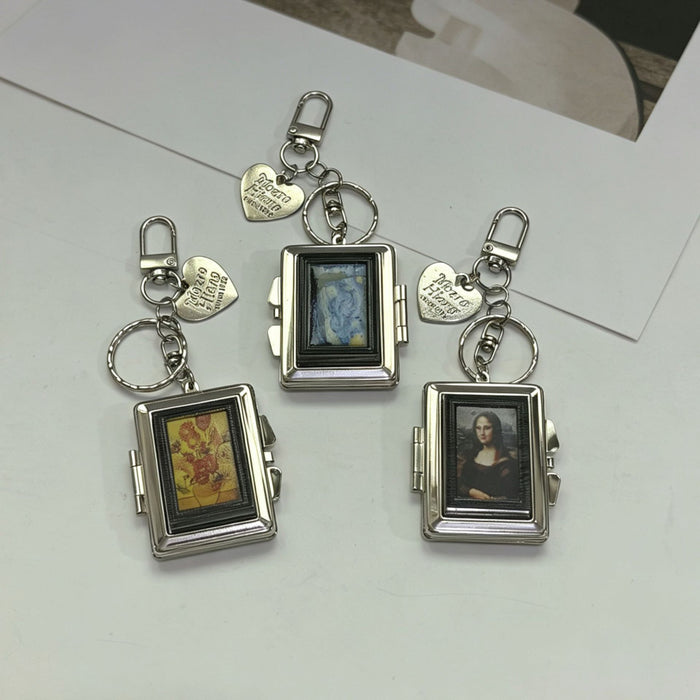 Wholesale Double-Sided Cosmetic Mirror Mona Pattern Bag Charm Keychain Zinc Alloy Boutique