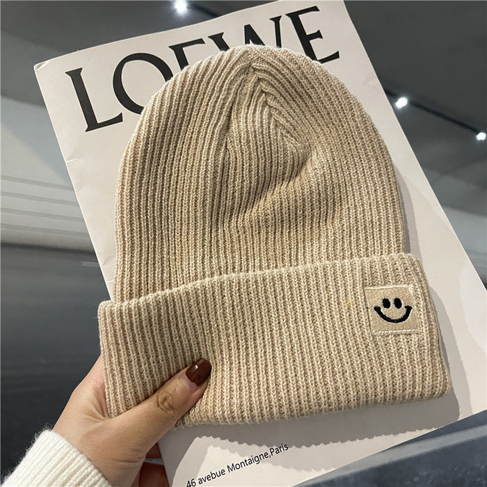 Wholesale Autumn and Winter Cute Smiley Face Logo Wool Knitted Hat JDC-FH-Yizhan002