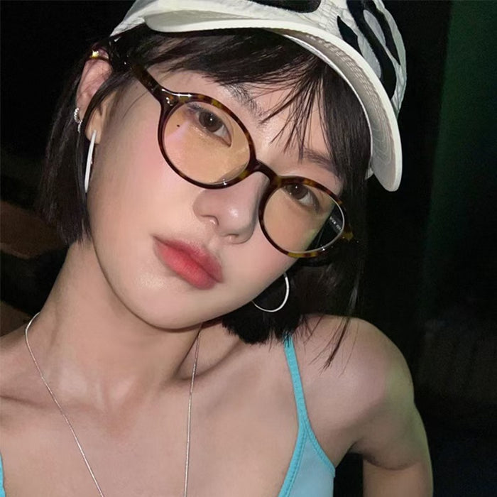Wholesale Retro oval nerd glasses for women, fashionable small frame, anti blue light, plain frame, fashionable sunglasses