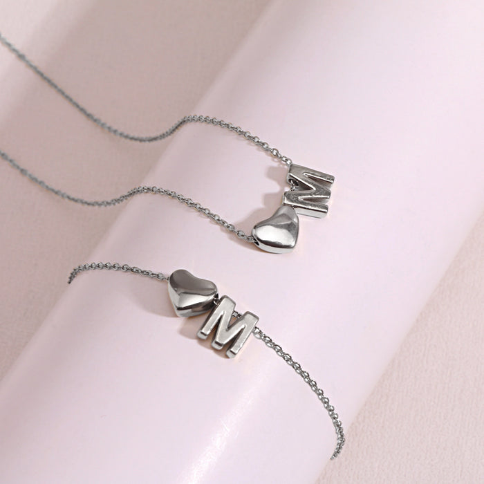Wholesale Clavicle chain jewelry accessory 26 letter heart pendant titanium steel necklace