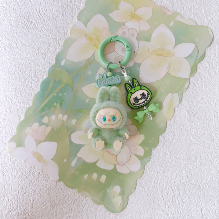 Wholesale Doll Enamel Sitting Posture Cute Mobile Phone Pendant Keychain