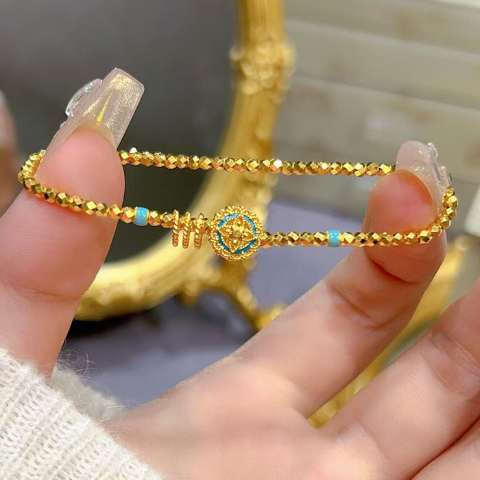 Wholesale Retro gold bead hollow four leaf clover light luxury fashion high-end bracelet accessory