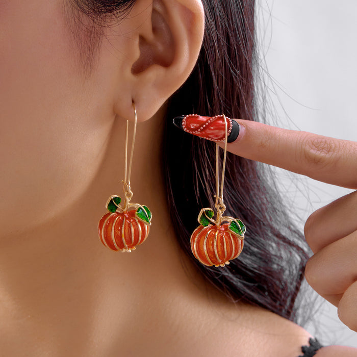 Wholesale  element earrings are fashionable and versatile.   oil drip pumpkin asymmetrical skull earrings