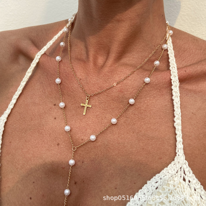 Wholesale Temperament imitation pearl chain long tassel necklace simple cross pendant collarbone chain