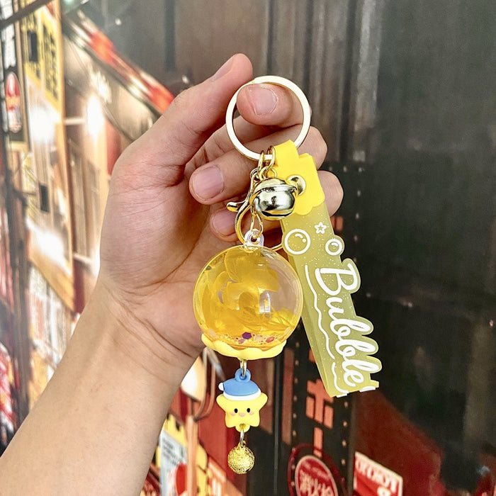 Wholesale Acrylic Oil-filled Wind Chime Quicksand Floating Doll Keychain JDC-KC-Benxin024