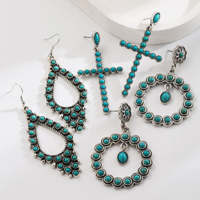 Wholesale Vintage cross-shaped openwork oval turquoise earrings