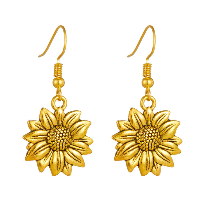 Wholesale Exaggerated gold sunflower titanium steel gold-plated earrings