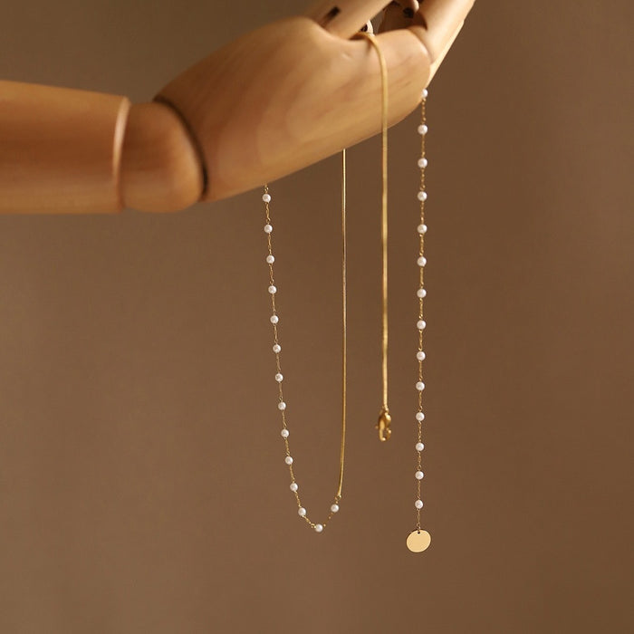 Wholesale Two pairs of romantic double-layer pearl necklaces, stacked collarbone chains, sweater chains, small, fresh, and high-end feel