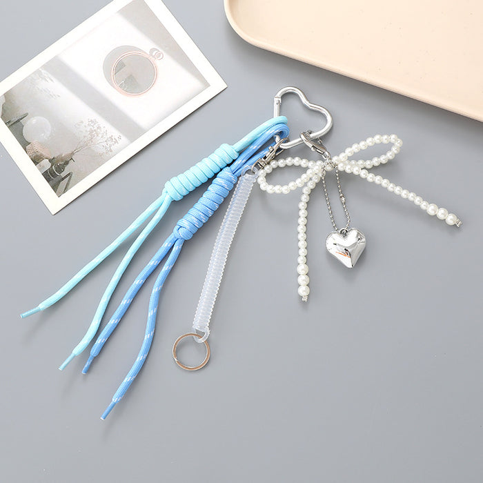 Wholesale Leather bow heart pendant luggage keychain lanyard accessories single buckle tassel pendant accessories