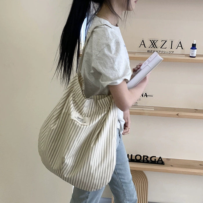 Wholesale Splicing striped canvas bag with simple temperament and large capacity commuting shoulder bag