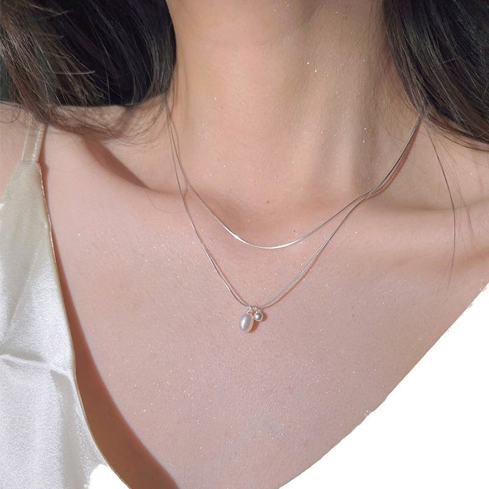 Wholesale Simple double-layer stacked natural pearl necklace, fashionable and personalized collarbone chain, versatile and high-end