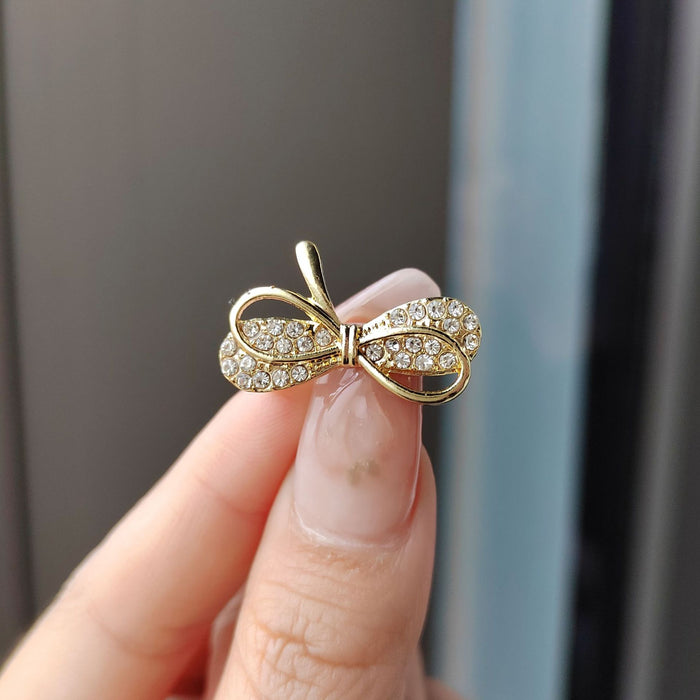 Wholesale bow brooch buckle hanging buckle fixed clothes accessories women