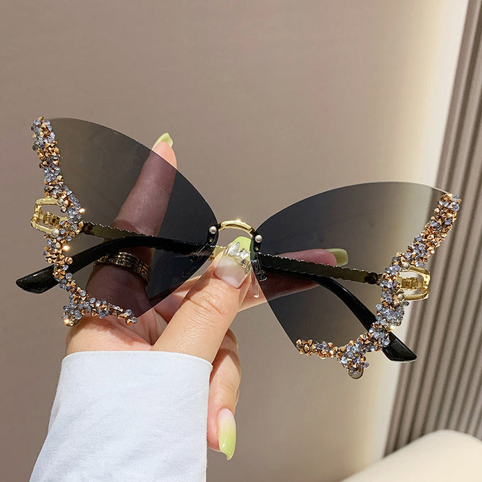 Wholesale New butterfly studded diamond rimless sunglasses with fashionable and exaggerated personality