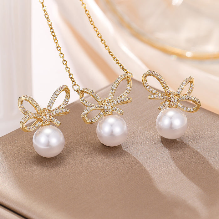 Wholesale Light Luxury Small and Exquisite Elegant Sweet Fashion All-match Women's High-end Bowknot Pearl Necklace Earrings suit