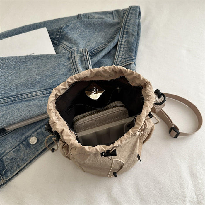 Wholesale Small niche design drawstring bucket bag, outdoor sports, leisure, fashion, versatile nylon crossbody bag